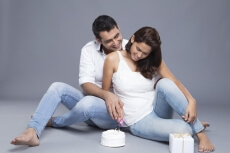 couple cutting cake
