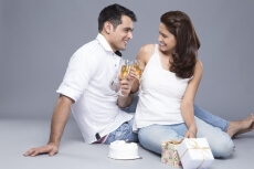 couple celebrating with champagne 