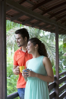 couple having coffee on the balcony