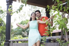 couple enjoying the weather in the balcony