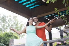 couple enjoying the weather in the balcony