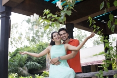 couple enjoying the weather in the balcony