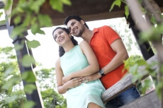 couple enjoying the weather in the balcony