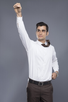 man pointing fist in air 