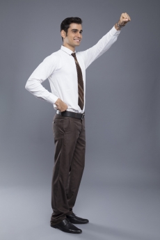 man pointing fist in air 