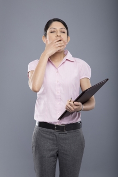female employee tired with boredom