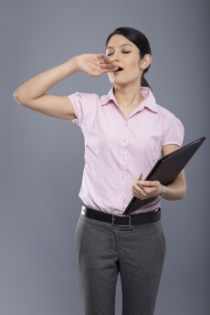 female employee tired with boredom