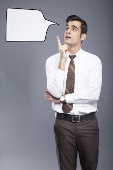 man formally dressed with a thought box 