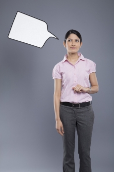professionally dressed woman with a thought box