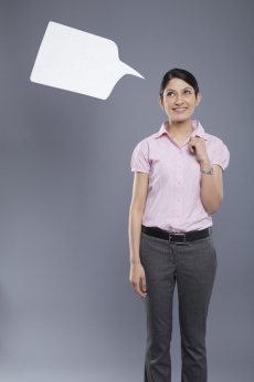 professionally dressed woman with a thought box