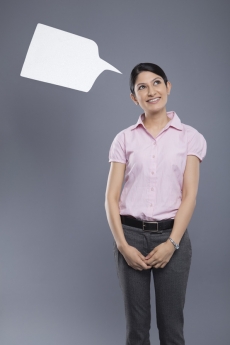 professionally dressed woman with a thought box