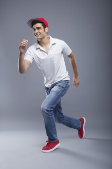 young man pretending to run 