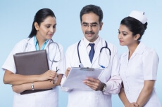doctors checking reports 