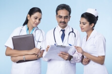 doctors checking reports 