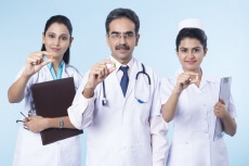 team of doctors giving medicines 