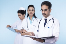 doctors working and checking reports