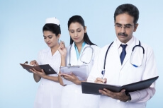 doctors working and checking reports