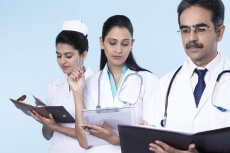 doctors working and checking reports 