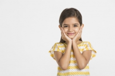girl kid smiling and posing 