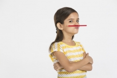 young girl with pencil 