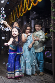 kids playing with water bubbles  