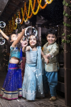 kids playing with water bubbles  