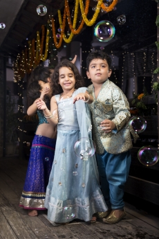 kids playing with water bubbles  