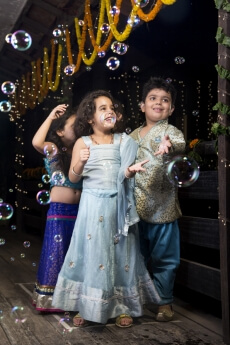 kids playing with water bubbles  