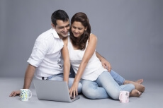 couple using a laptop 
