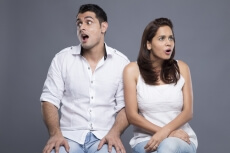 couple sitting in white clothing