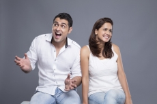 couple sitting in white clothing