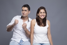 couple sitting in white clothing