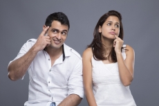 couple sitting and thinking about something