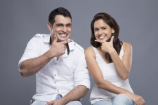 couple smiling and posing 