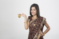 woman in saree with jewellery