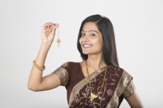 woman in saree with jewellery