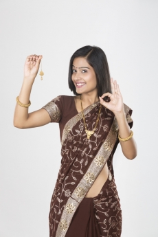 woman in saree with jewellery