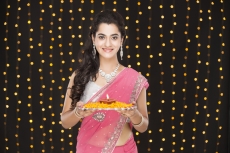 woman with pooja thali