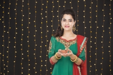 girl holding diya and posing 