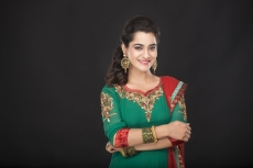 girl posing while hands folded