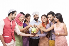 people from all religions with piggy bank 