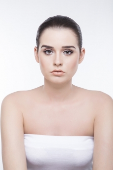 girl with smooth skin looking at the camera