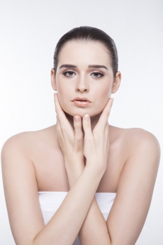 girl with pretty face showing her smooth skin