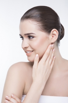 girl posing with her perfectly smooth skin