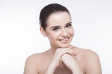 girl posing while flaunting her perfect skin