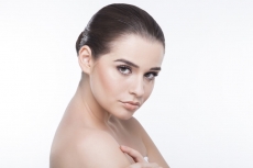 beautiful young girl showing her perfect skin