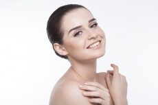 beautiful girl showing her smooth skin