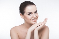 girl with beautiful skin posing and smiling