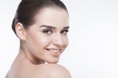 beautiful girl showing her perfect skin