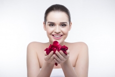 beautiful girl with rose petals 
